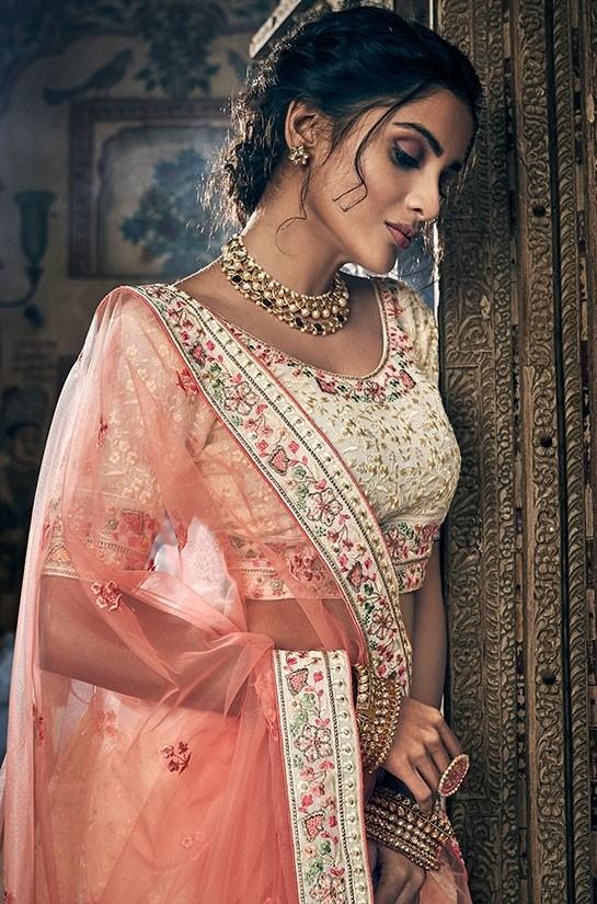 Pearls and lace- A white lehenga... - Nikita's bridal studio | Facebook