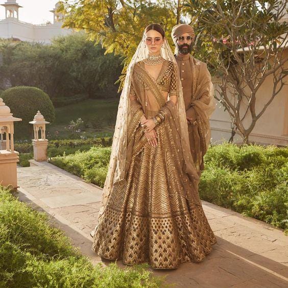 Inspo Alert! 13 Real Brides who looked Proper Patolas in Golden Lehengas |  WeddingBazaar