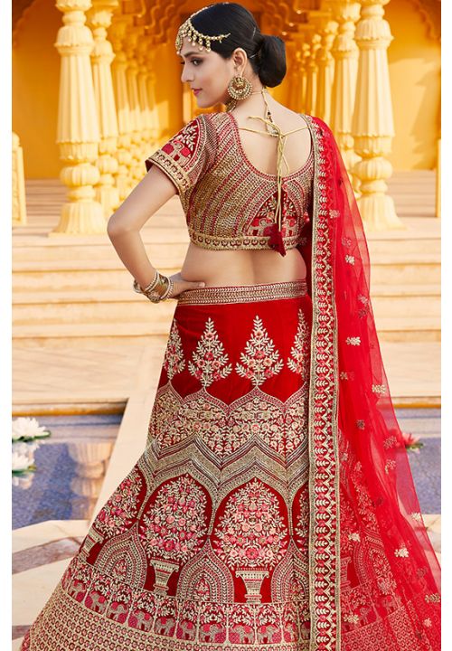 Carrot Red colored heavy embroidered Lehenga Set - Rent