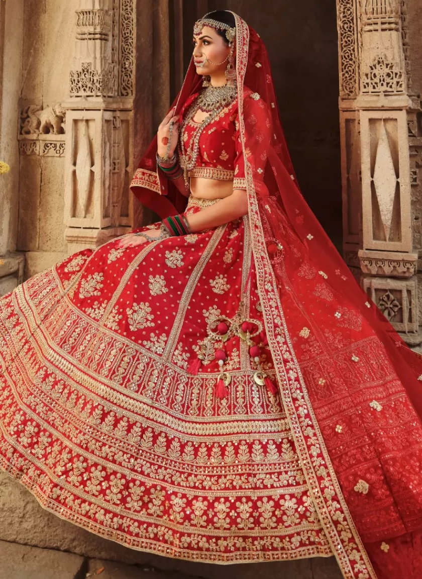 Red Bridal Lehenga with Heavy embroidery work - Aazuri